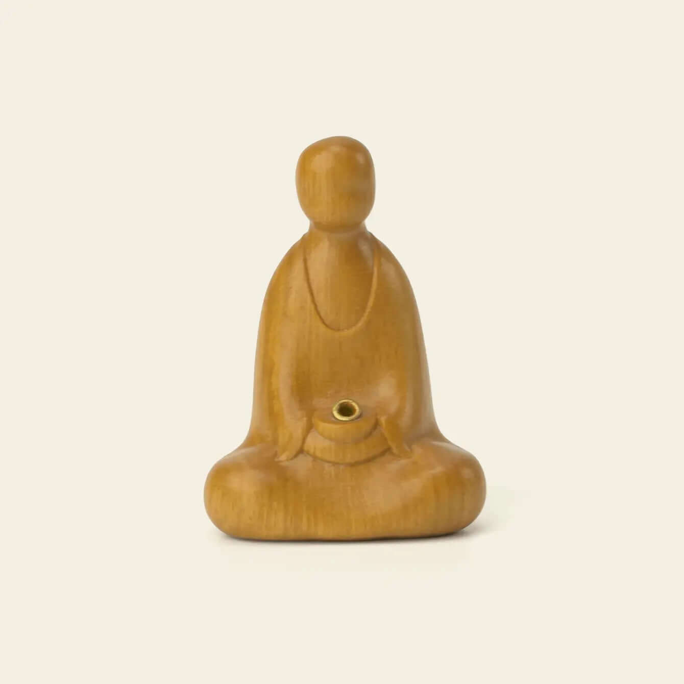 No Appearance Buddha Sandalwood Incense Holder with a minimalist seated figure made from light sandalwood.