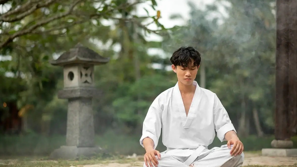 A person meditating outdoors, embodying Simple Ways to Practice Mindfulness in Everyday Life.