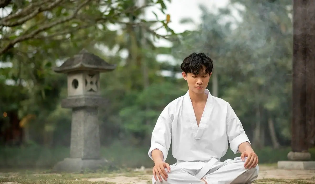 A person meditating outdoors, embodying Simple Ways to Practice Mindfulness in Everyday Life.