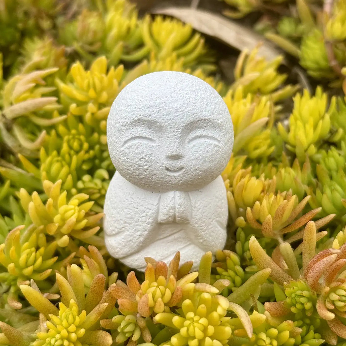 Zenify Jizo Monk statue on mossy ground for desktop zen garden meditation