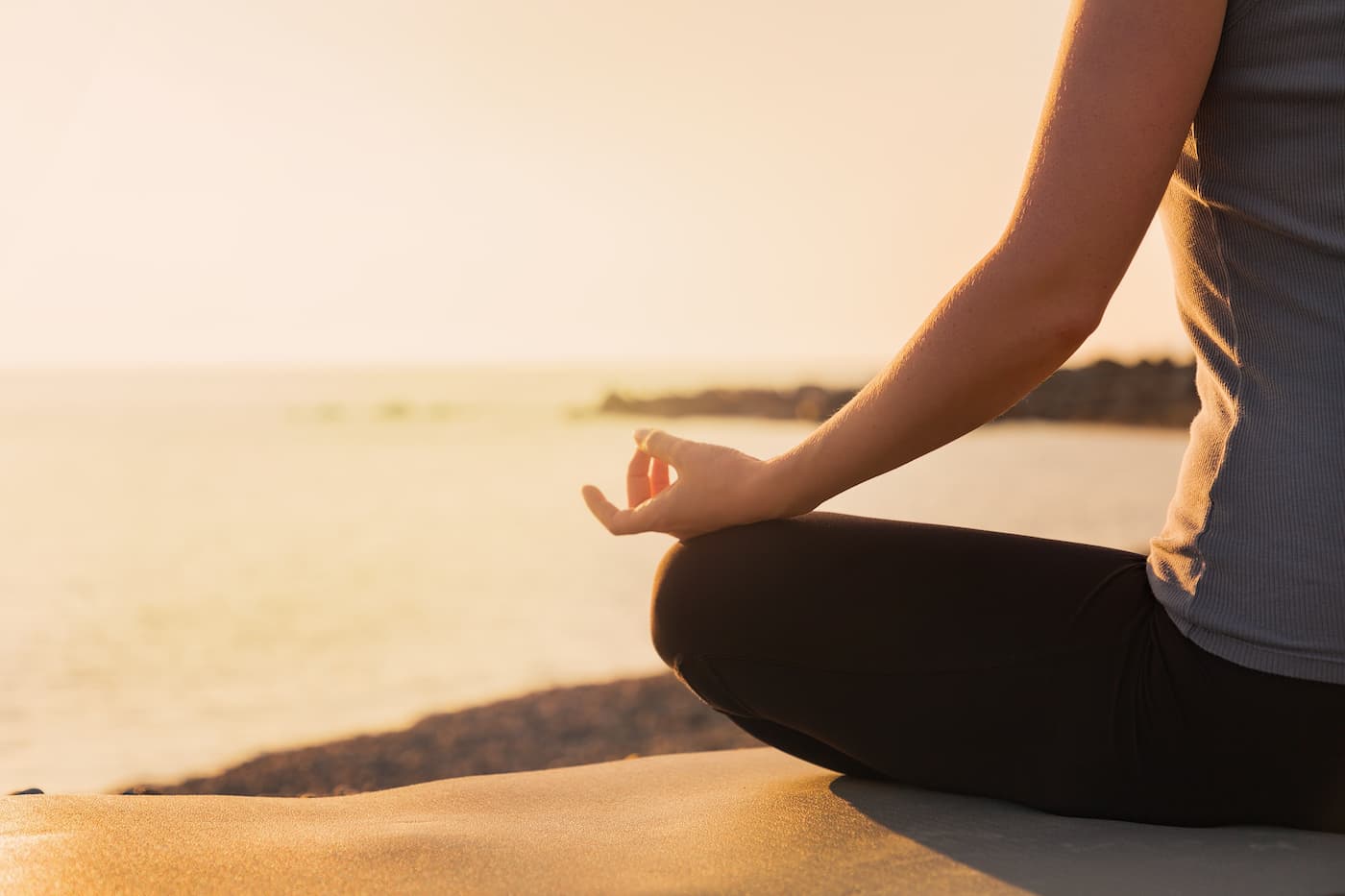 I Went to Church Seeking Comfort through meditation by the serene ocean at sunset.