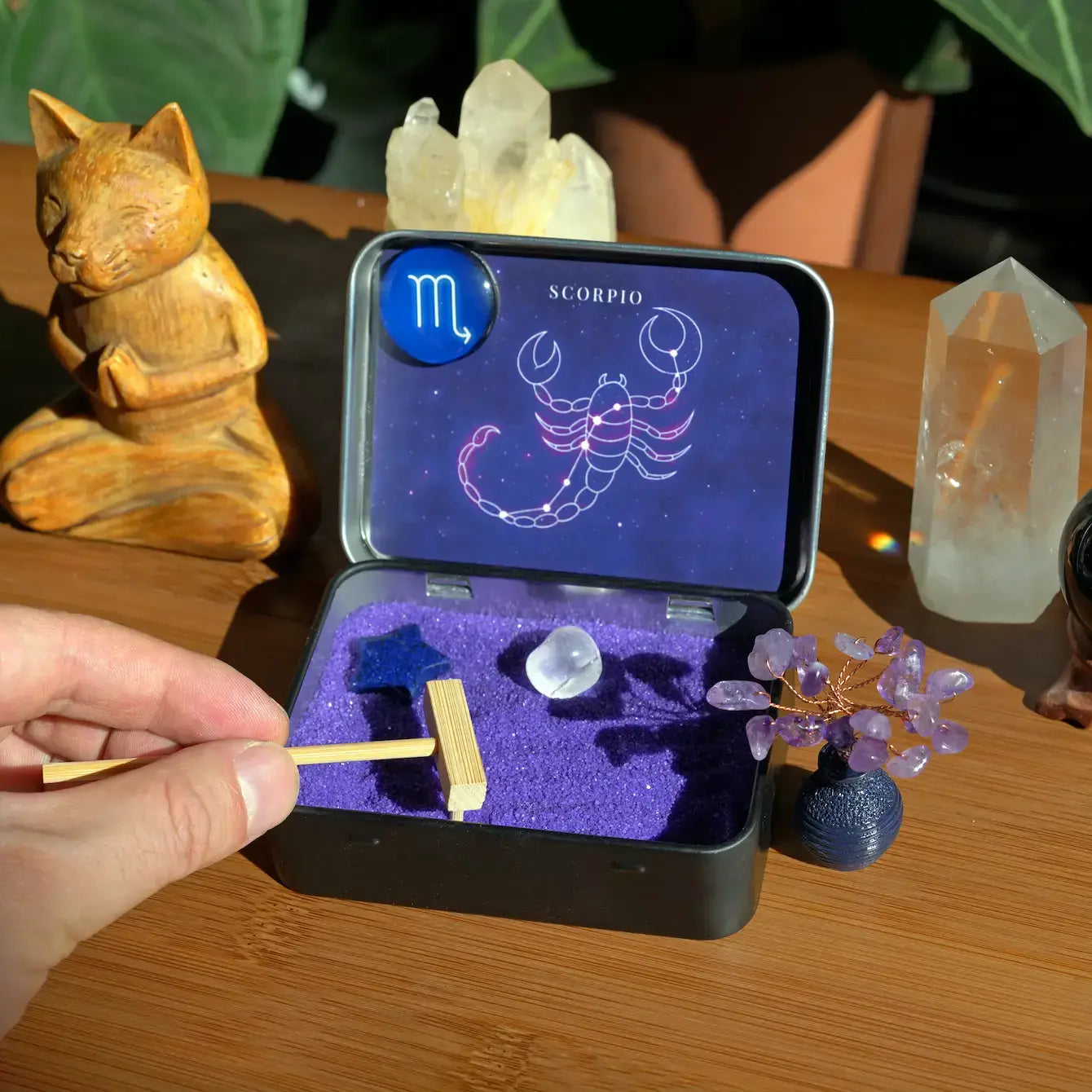 Scorpio Crystal Zen Garden showcasing amethyst tree, violet sand, and zodiac elements for calmness and serenity.