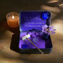 Scorpio Crystal Zen Garden featuring amethyst tree, deep-violet sand, candle, zodiac elements in a tranquil setting.