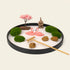 Zen Garden featuring pink flamingos, cherry blossom, rocks, and decorative elements for relaxation and tranquility.