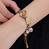 Zenify Citrine Cord Bracelet on wrist, showcasing citrine crystals and earth-toned cord, symbol of abundance and confidence.
