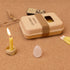 Portable meditation candle set featuring a natural beeswax candle, crystal for healing, and eco-friendly packaging.