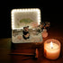 spirit animal crystal zen garden with a panda figurine, healing stones, and a candle for tranquility