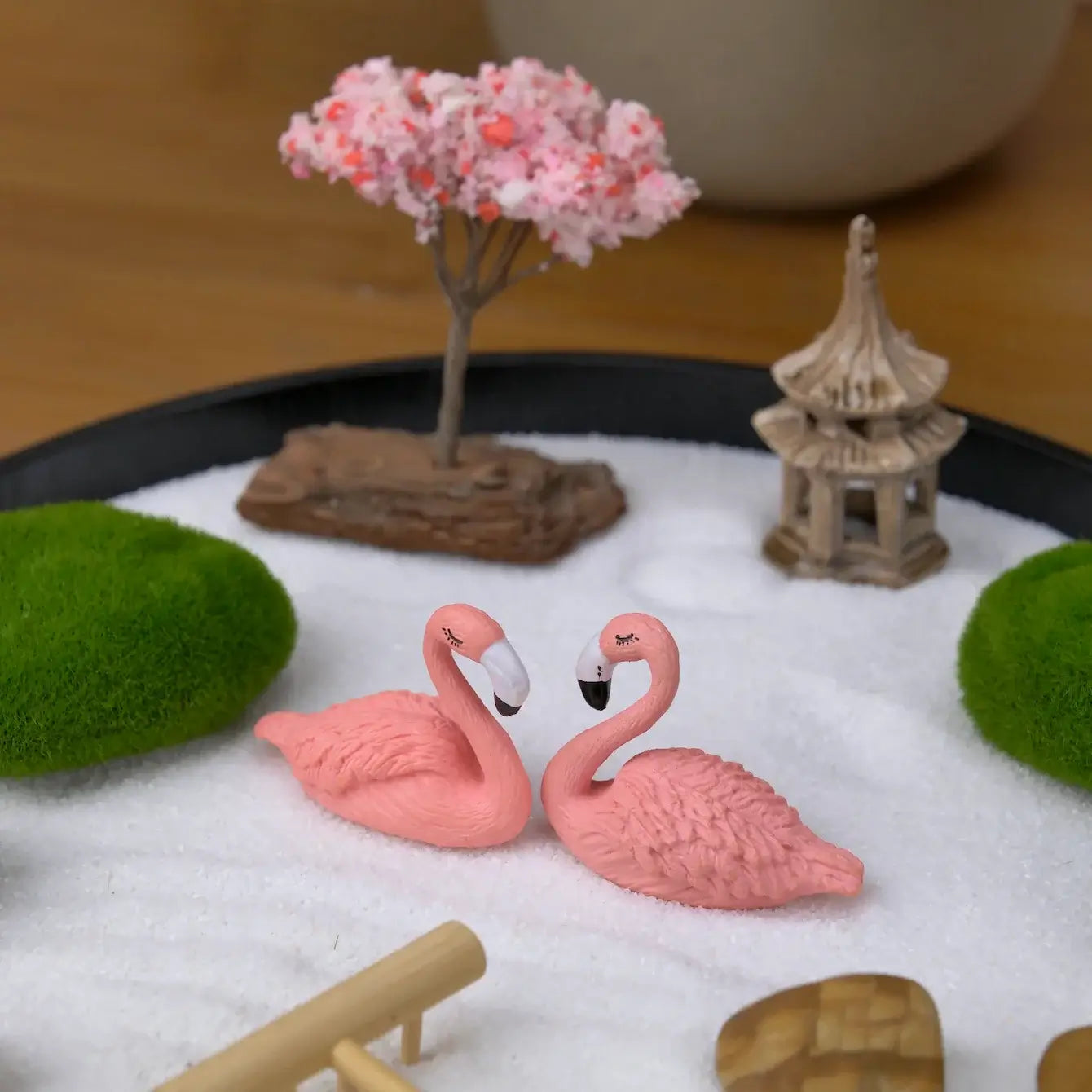 Zen Garden featuring pink flamingos, cherry blossom tree, and zen elements for relaxation and decor.