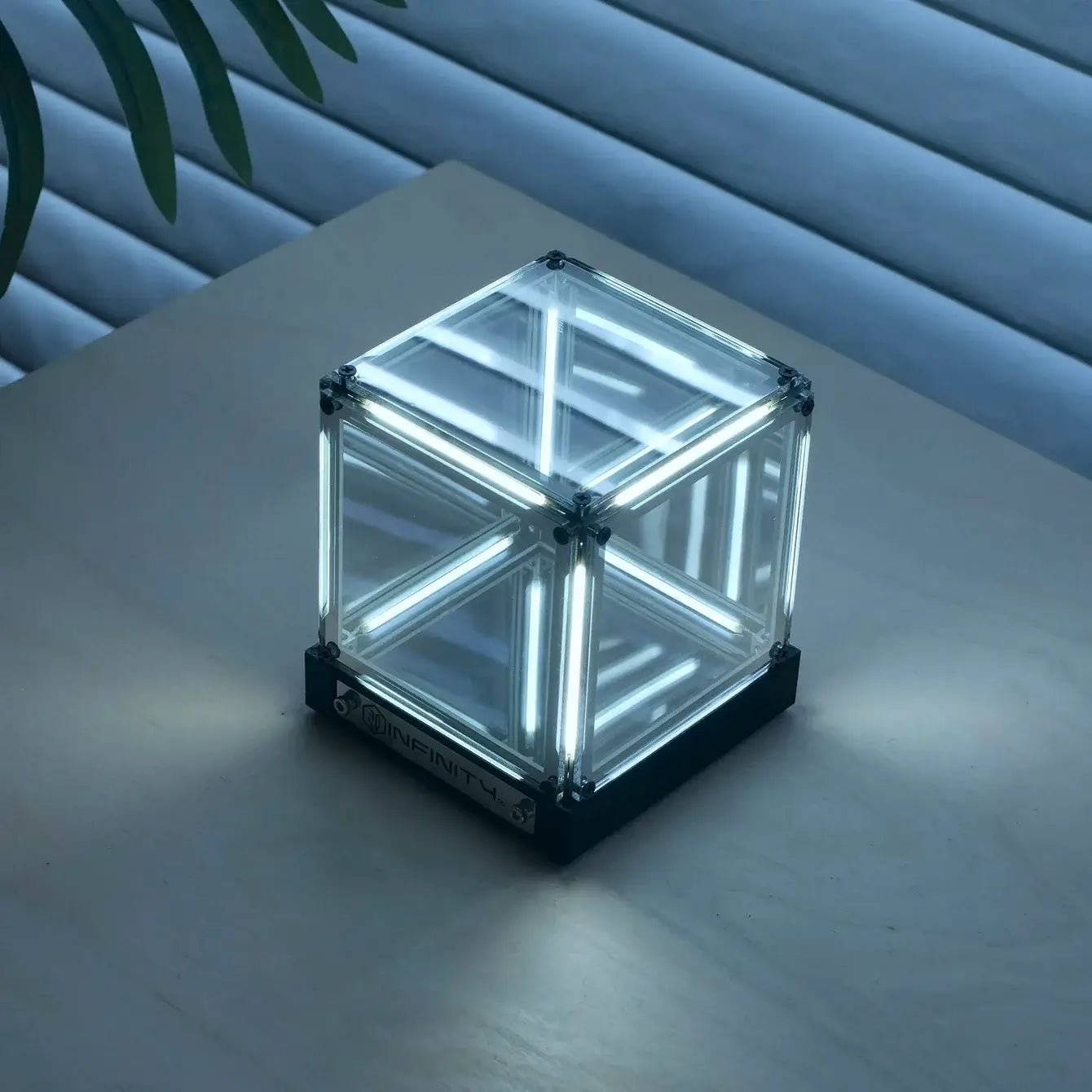 Transparent cube light on a wooden surface with a blurred background