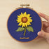 5-Hour Mindfulness Embroidery Kit featuring a sunflower design on blue fabric with wooden embroidery hoop.