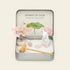 spirit animal crystal zen garden with white guardian figure, healing crystals, and decorative pink tree