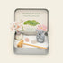 Spirit animal crystal zen garden featuring a koala, crystals, a flower, and tranquil elements for relaxation.