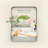 Spirit Animal Crystal Zen Garden featuring a cat, crystals, and greenery in a calming tin with a peaceful design.
