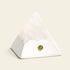 Mineral Pyramid Stone Lamp showcasing a calming glow with natural stone design on a neutral background.
