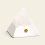 Mineral Pyramid Stone Lamp showcasing a calming glow with natural stone design on a neutral background.