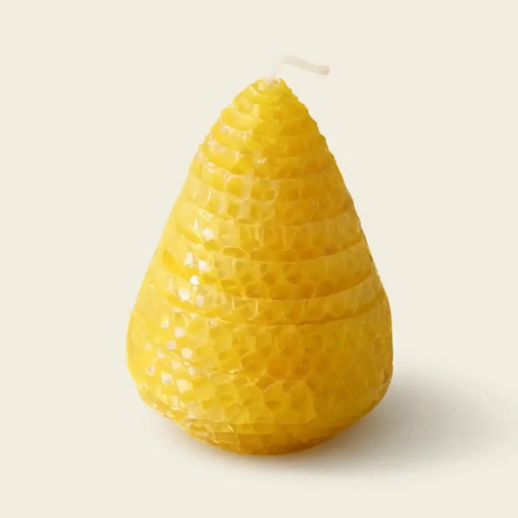 Beeswax Candle in a honeycomb shape, featuring a natural honey aroma and sculptural design.