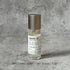 Portable Chakra Aromatherapy Mist for Yoga & Deep Meditation - 10ml bottle with a sleek design and minimalist label.