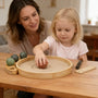 Desktop Zen Garden with a mother and child enjoying tactile play with bamboo sand tray and decorative stones.