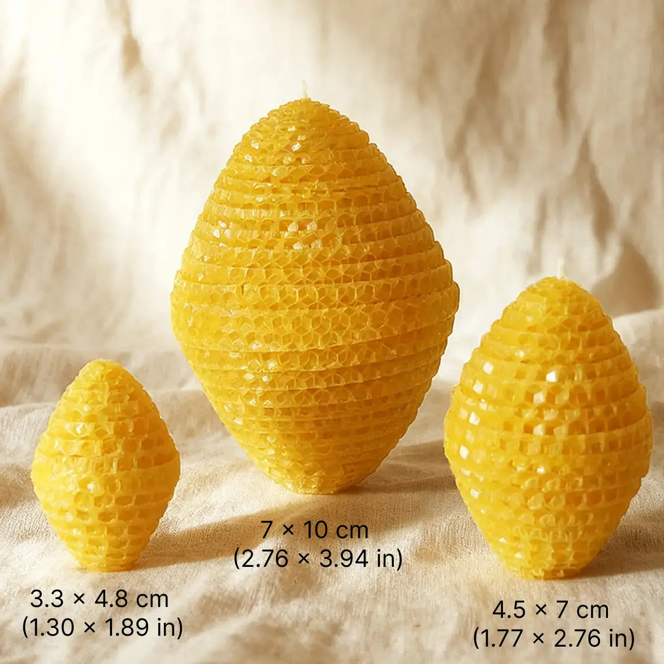 Beeswax Candle trio in geometric shapes, featuring warm honey aroma and natural beeswax texture.