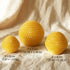 Beeswax Candle set featuring three sizes: small, medium, and large geometric shapes showcasing natural honey aroma.