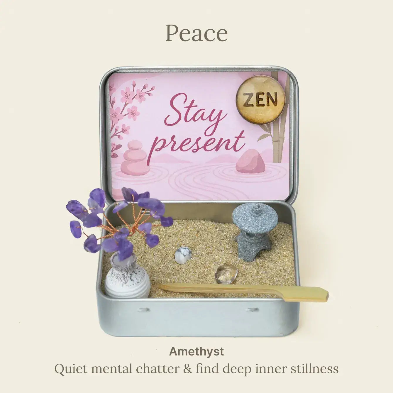 Japanese Crystal Zen Garden in a tin with decorative stones and a mini zen figurine, promoting relaxation and mindfulness.