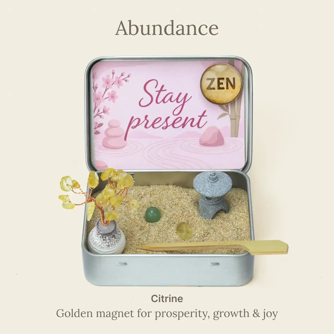 Zenify™ Japanese Crystal Zen Garden in a tin with sand, stones, and decor promoting meditation and stress relief.