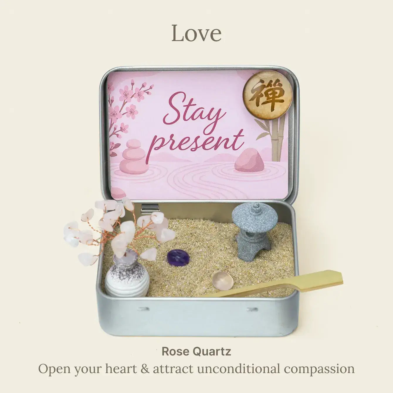 Zenify™ Japanese Crystal Zen Garden with rose quartz for love and compassion, featuring a serene desktop design.