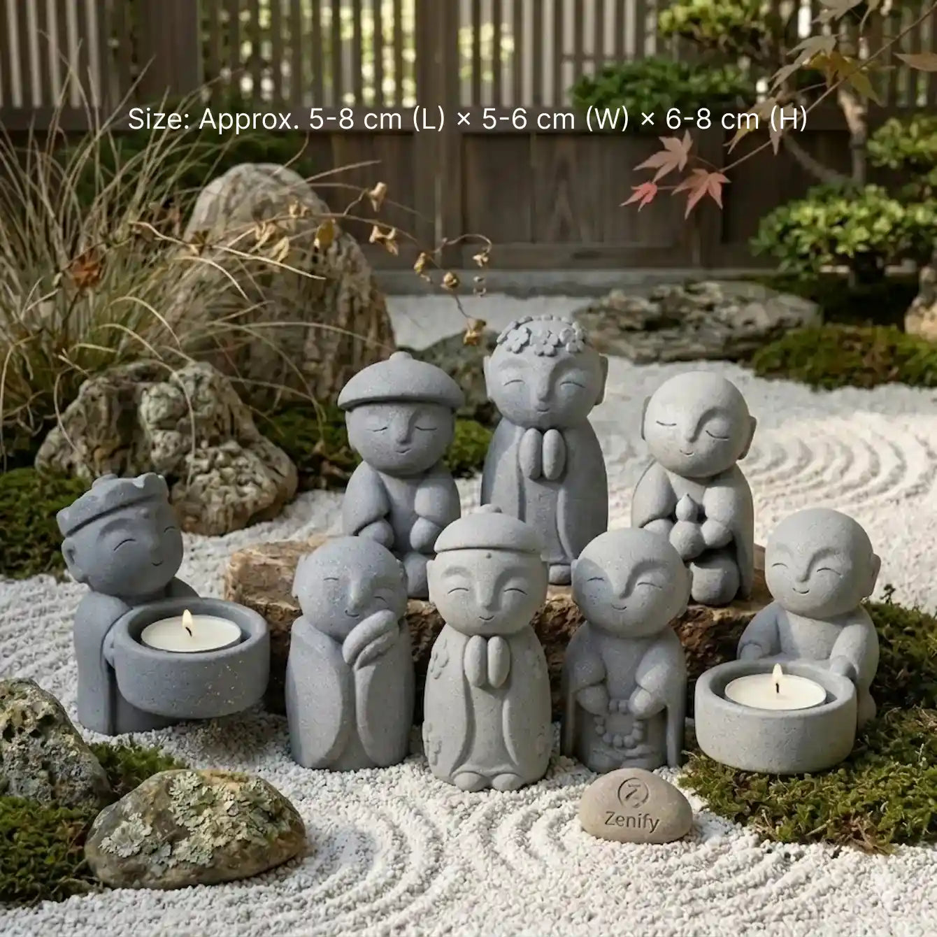 Zen-Stone Jizo monk cement figurine collection with candle holders displayed in a serene stone garden setting.