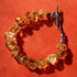 Natural Citrine Bracelet Jewelry featuring raw citrine crystals on a textured background.