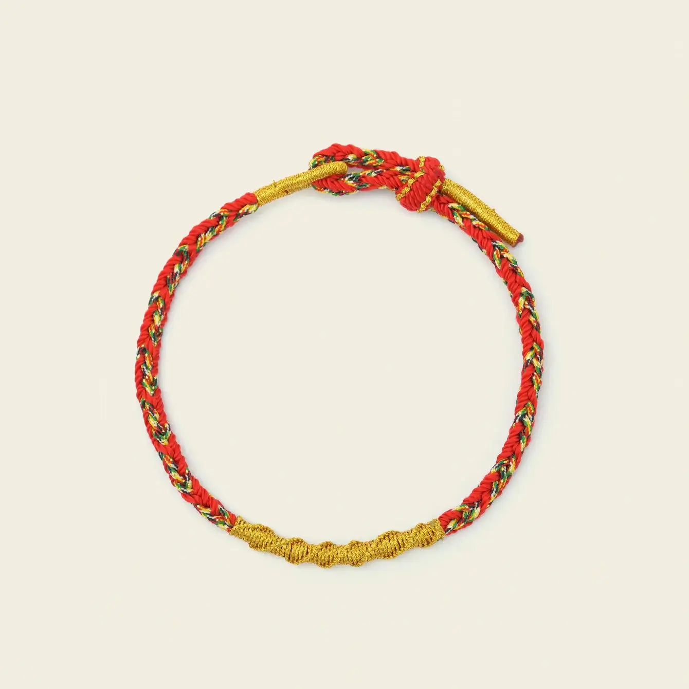 Zenify™ Fortune Knot – Handwoven Lucky Cord Bracelet in vibrant red and gold colors.