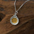 Zenify™ Zodiac Harmony Necklace featuring a Nine Palaces Bagua pendant on a silver chain.