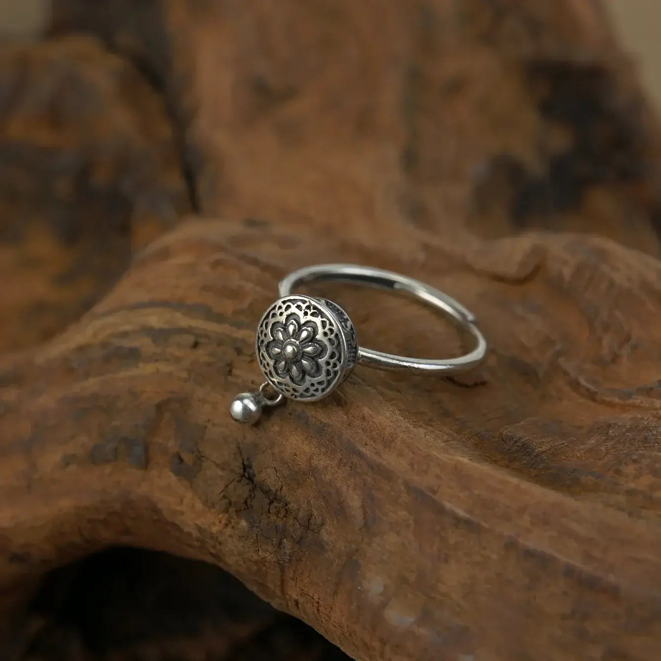Zenify™ Silver Mantra Ring featuring intricate floral design, perfect for mindfulness and meditation.