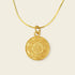 Gold plated Dual Blessings necklace featuring a round pendant with intricate designs, symbolizing Lotus and Vajra.