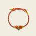 Zenify™ Sutra Light Knot – Handwoven red and yellow blessing bracelet with sacred knot design.