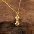 Vajra’s Power pendant necklace featuring a golden Vajra symbol with colorful accents, symbolizing strength and calm.