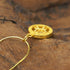 Gold plated detail of Zenify™ Dual Blessings necklace with intricate design on pendant.