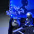 ET crystal zen garden featuring a fluorite tree and meditating ET figurine in black sand.