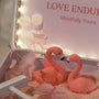 Love Endures Crystal Zen Garden featuring pink flamingos surrounded by soft pink sand and decorative elements.