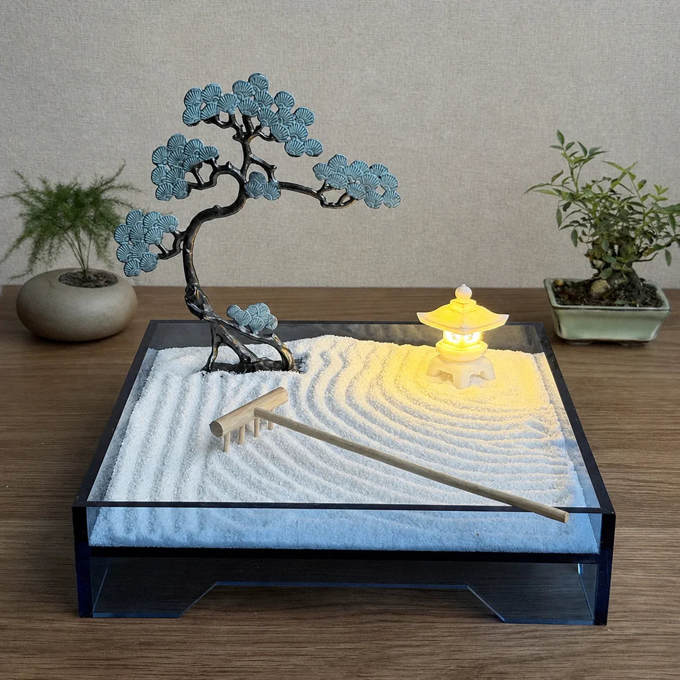 Blue acrylic Zen garden with copper pine tree, battery-lit resin stone lantern, fine white sand and wooden rake