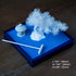 Blue Zen Garden set with deep blue sand, white pine tree, miniature stone lantern, white rake, and product dimensions.