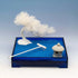 Blue Zen Garden with deep blue sand, white pine tree, miniature stone lantern, and white rake in a rectangular tray.
