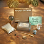 Japanese Crystal Zen Garden kit including calming elements like stones, sand, and mindfulness cards for relaxation and balance.