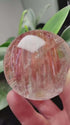 Zenify™ Rutilated Quartz Crystal Sphere, 50mm, showcasing golden threads in a clear sphere, perfect for meditation or decor.