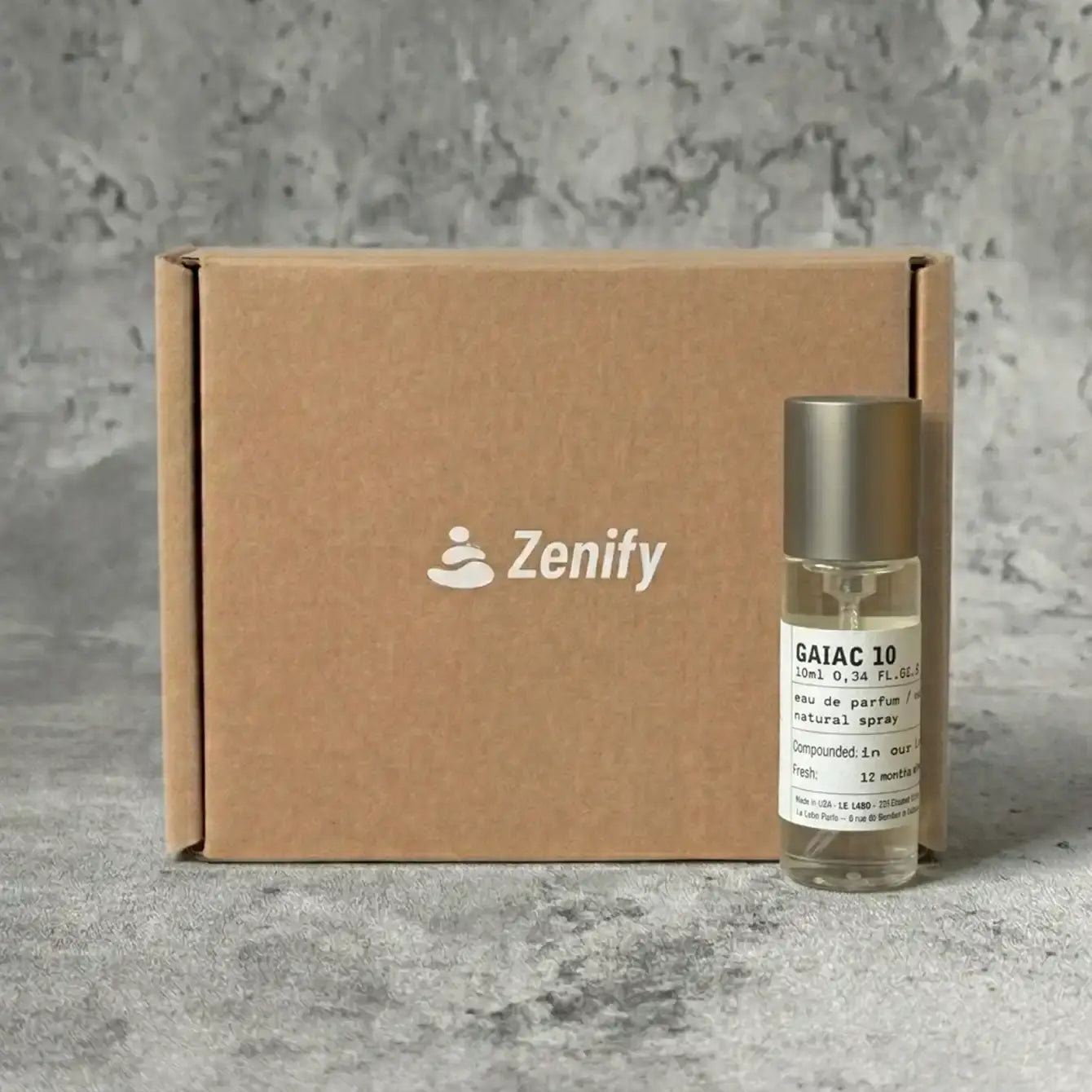 Portable Chakra Aromatherapy Mist for Yoga & Deep Meditation - 10ml bottle next to a Zenify branded cardboard box.