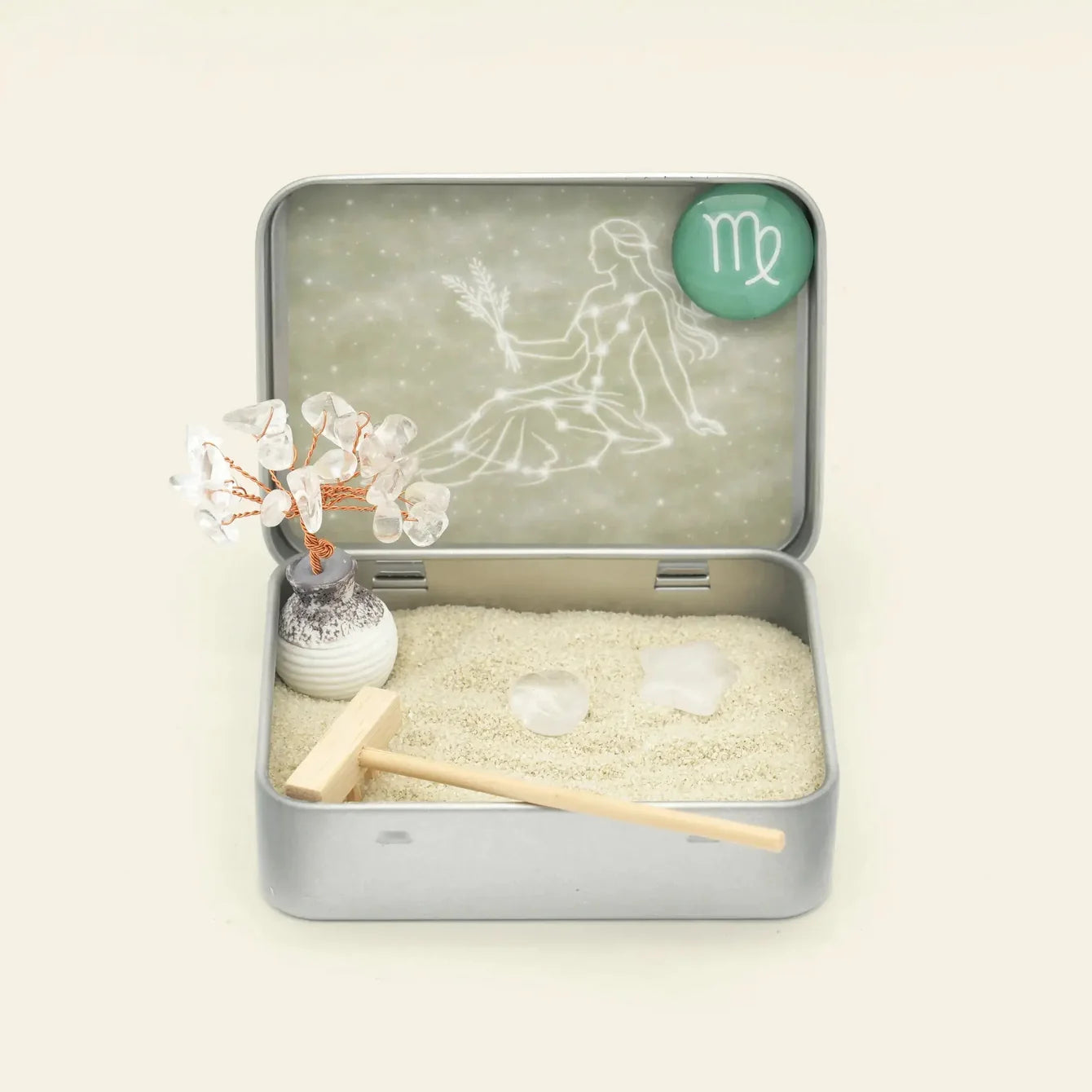 Virgo Crystal Zen Garden in an open tin with clear quartz tree, white sand, star stone, miniature rake, and Virgo details.