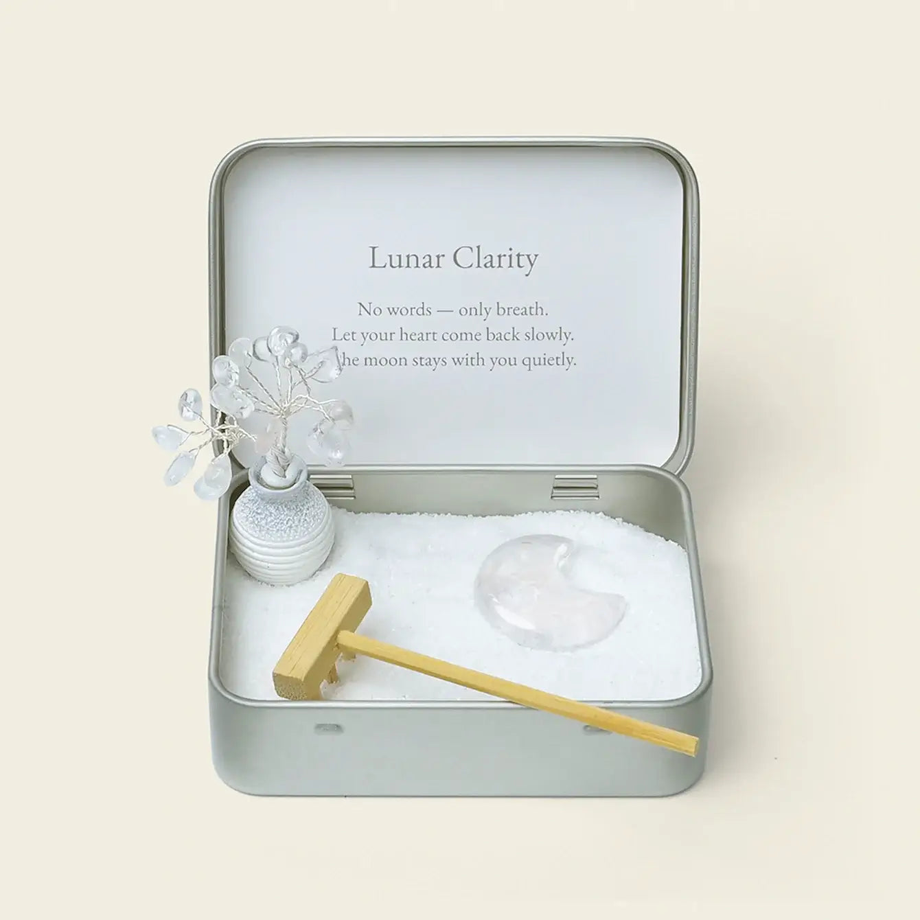 White Moon Crystal Zen Garden with quartz, white sand, and calming accessories for mindfulness.