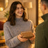 Person presenting a 'Pocket of Calm' box in a cozy setting, promoting relaxation and mindfulness.