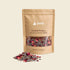 Nightfall 20 g kraft pouch with dried lavender buds and rose petal fragments arranged in front.