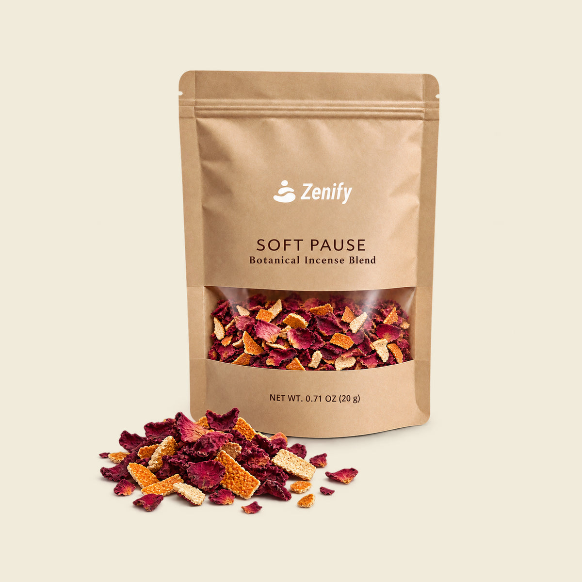 Soft Pause 20 g kraft pouch with dried rose petal fragments and orange peel pieces arranged in front.