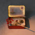 12-Zodiac Crystal Zen Garden with decorative items, including a pig figurine and a red flower, lit from within.